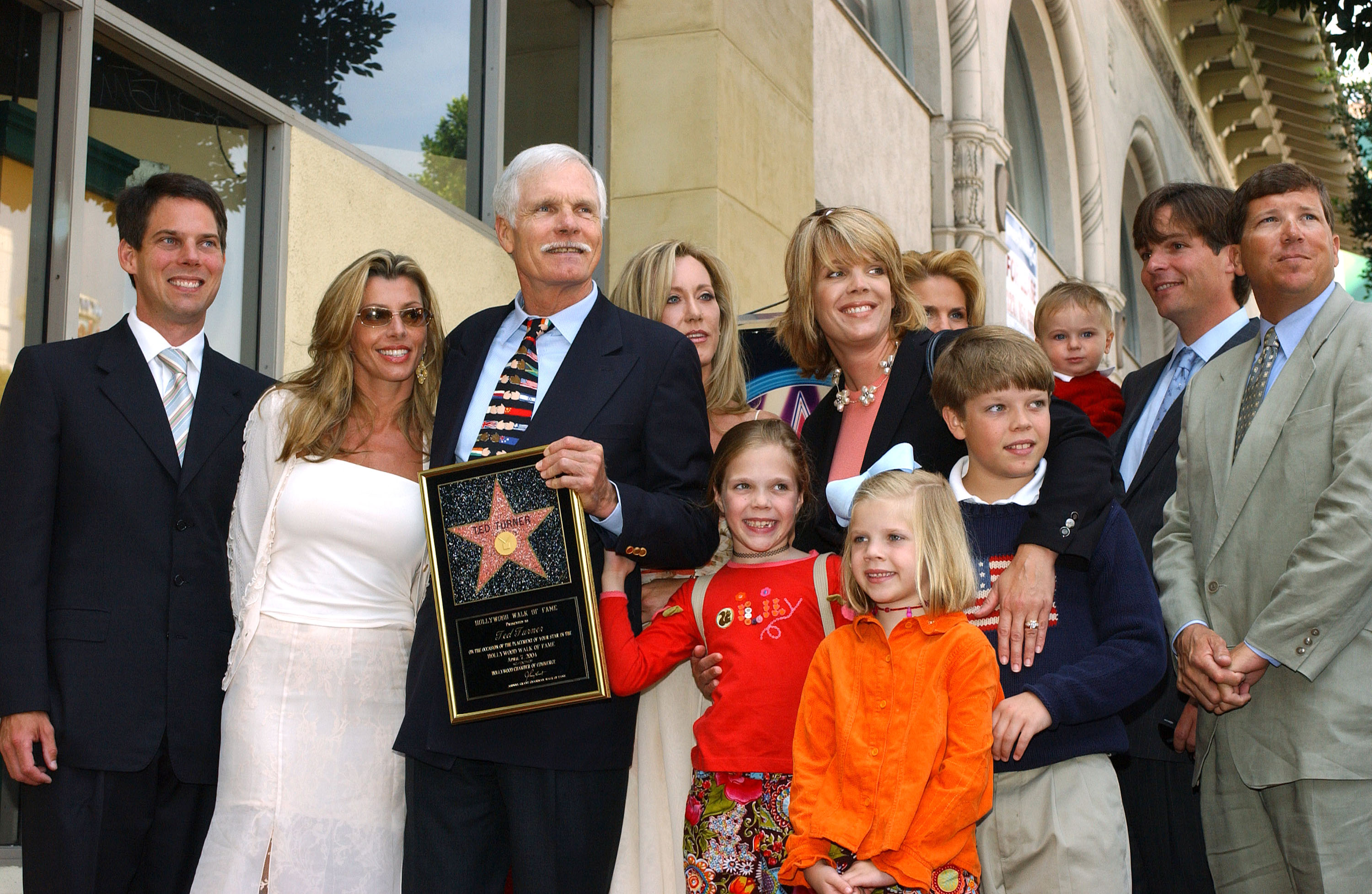 Ted Turner attends his Hollywood Walk of Fame ceremony with family members in Hollywood, California, on April 7, 2004 | Source: Getty Images
