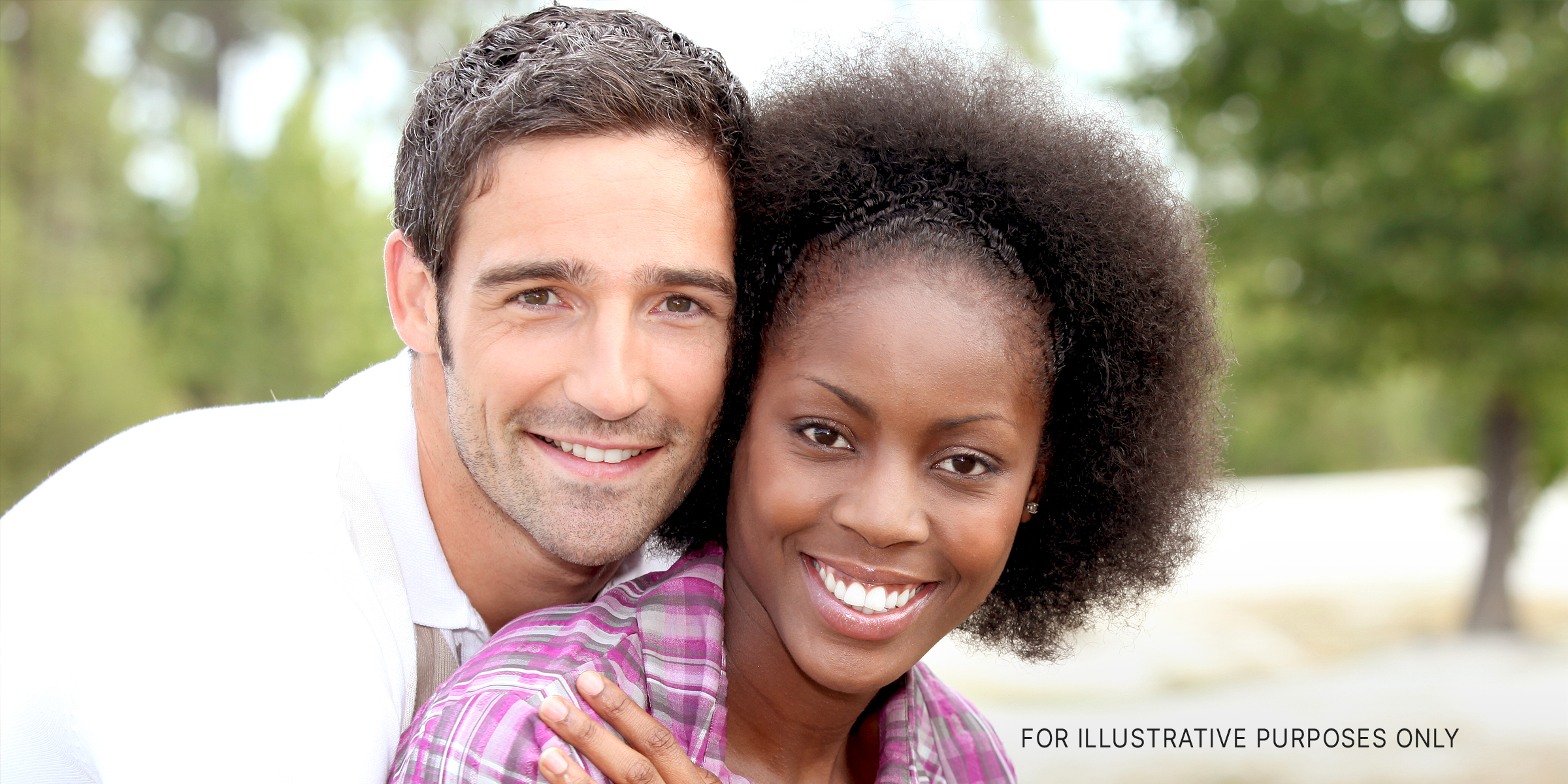 A white man with a black woman | Source: Shutterstock