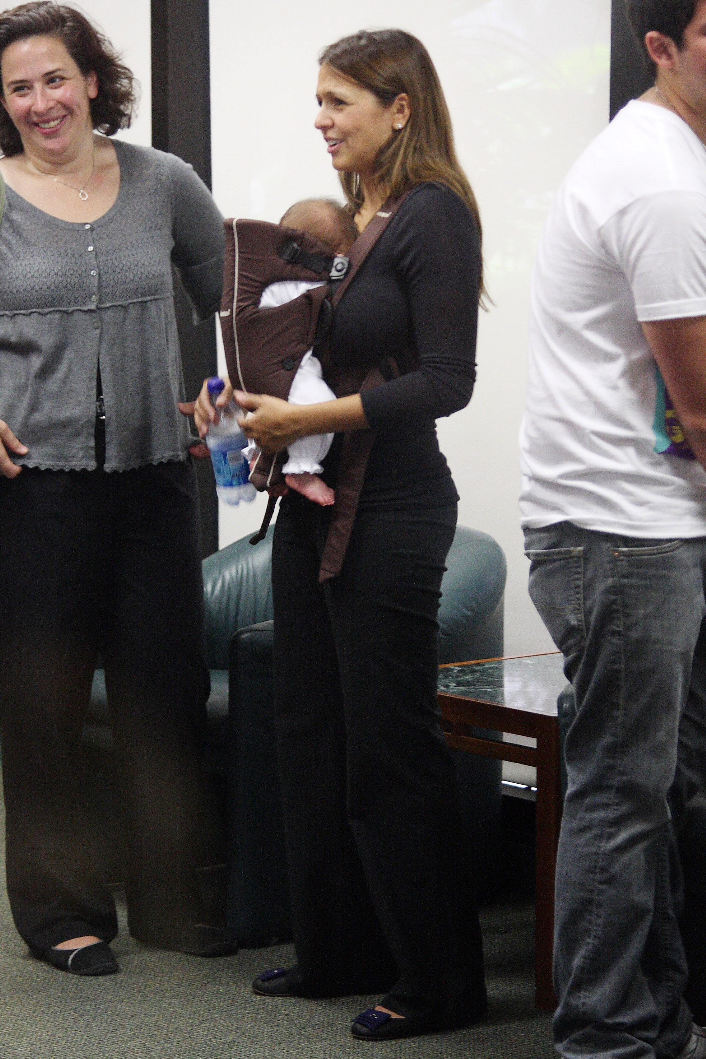 Luciana Damon carries daughter Gia Zavala Damon during an appearance at the University of Miami. | Source: Getty Images