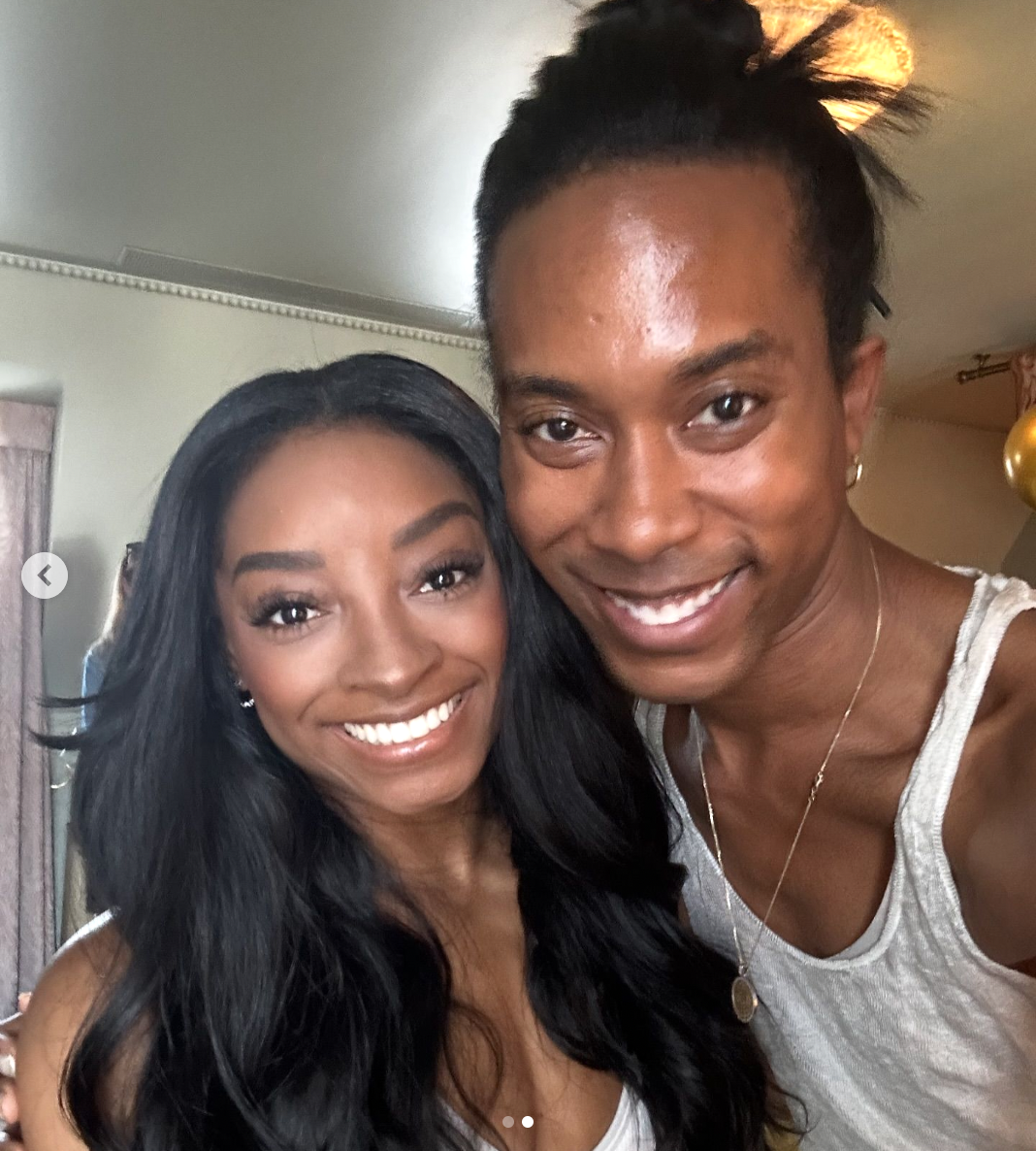 Simone Biles posing for a picture with her hairstylist Brenton Diallo, posted on August 6, 2024 | Source: Instagram/brentondiallo