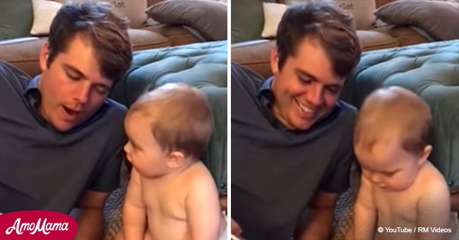 Baby says 'Mama' after dad reads a whole book about 'Dada' (video)