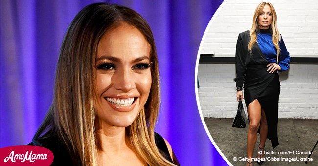 Jennifer Lopez turns heads in 2-toned dress, flaunting her legs through a racy thigh-high slit