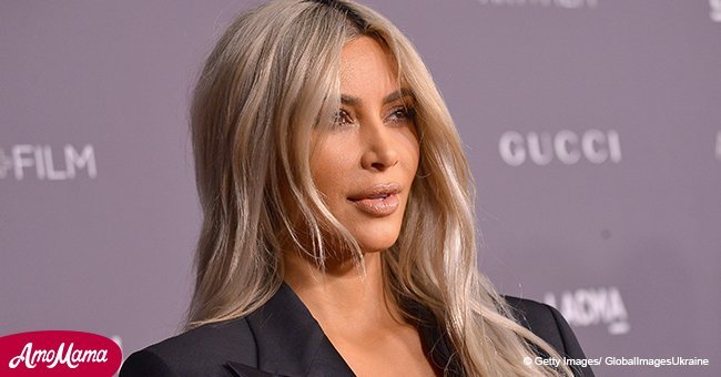 Kim Kardashian shares a rare photo of herself and husband with their three little children