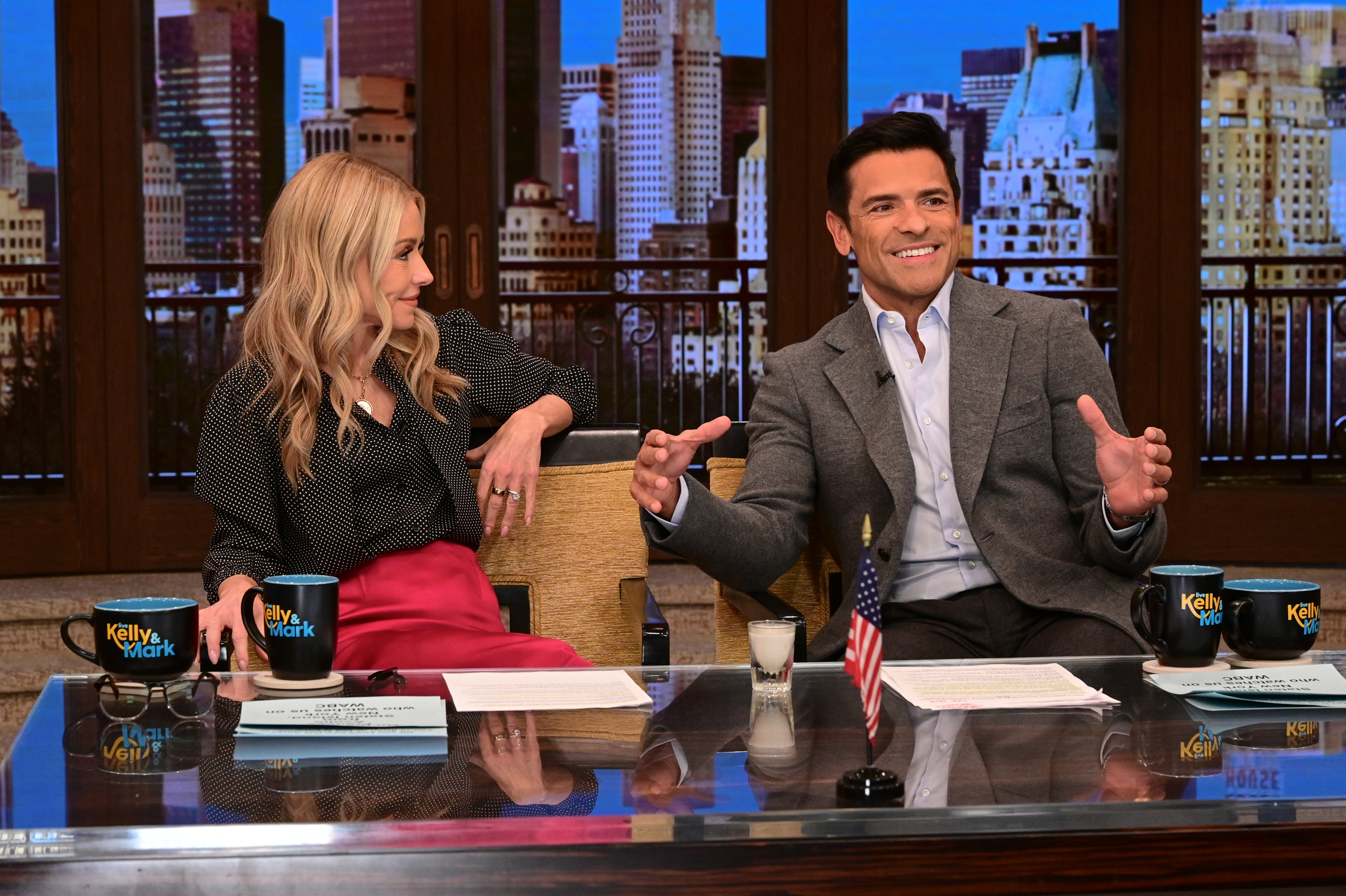 Consuelos sat alone at the host desk before addressing her abrupt disappearance, revealing that doctors placed his famously talkative wife under an enforced gag order. | Source: Getty Images