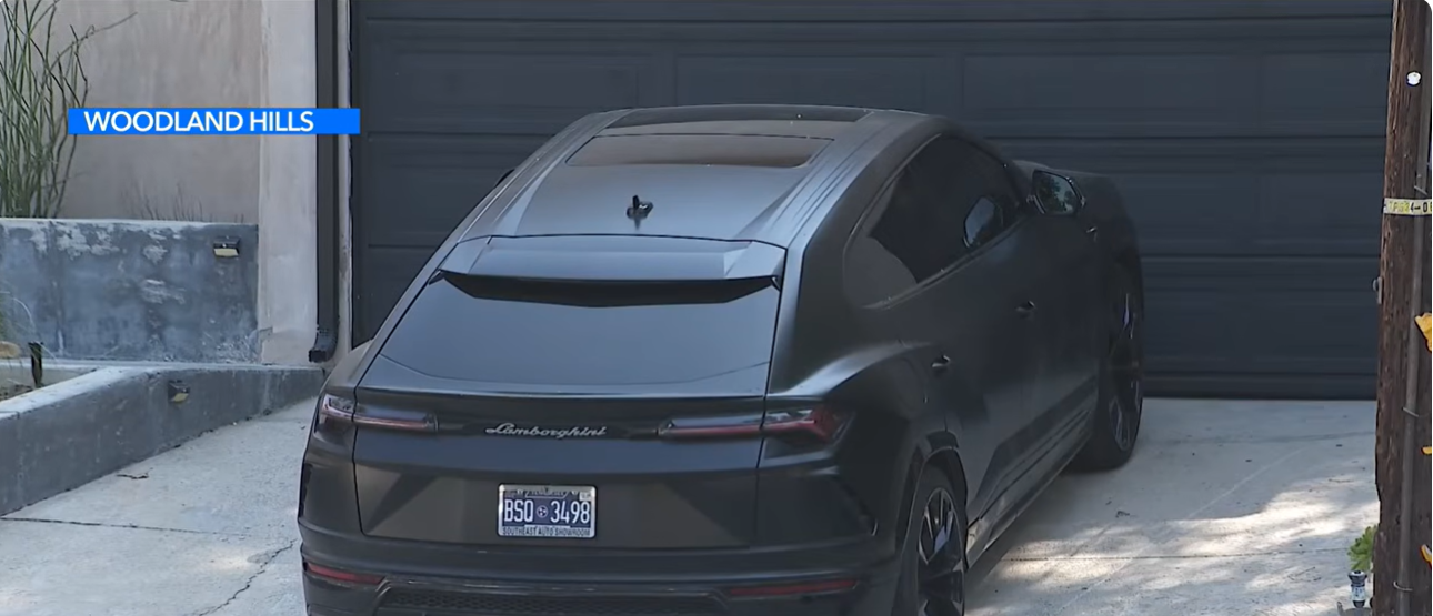 A black Lamborghini parked outside Brandon Clarke's Woodland Hills home. | Source: YouTube/KTLA 5