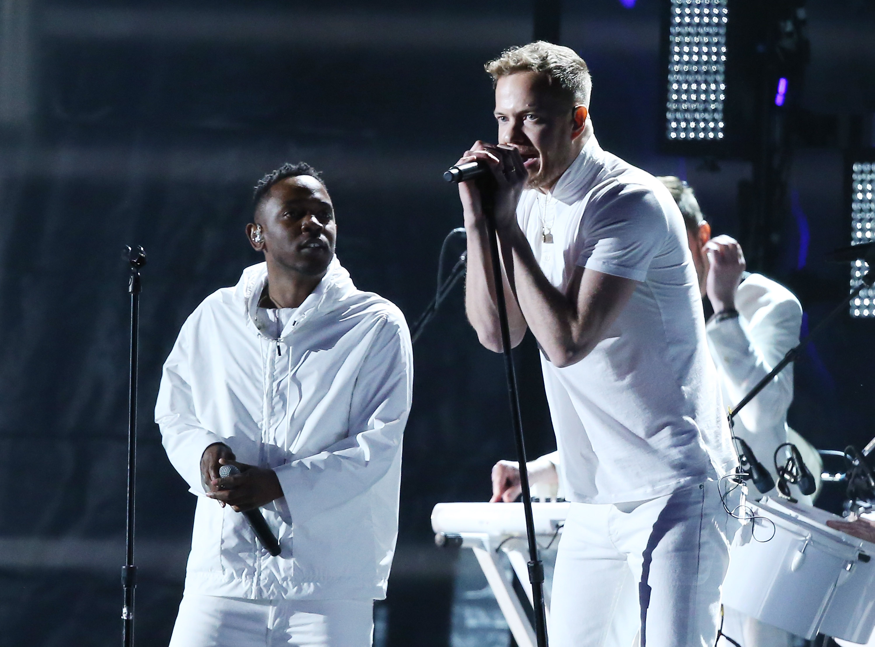 Kendrick Lamar and Dan Reynolds of Imagine Dragons performing during the 56th Grammy Awards on January 26, 2014, in Los Angeles, California. | Source: Getty Images