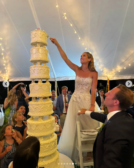 Mariah Kennedy Cuomo cutting her wedding cake, posted on July 22, 2024 | Source: Instagram/kerrykennedyrfk