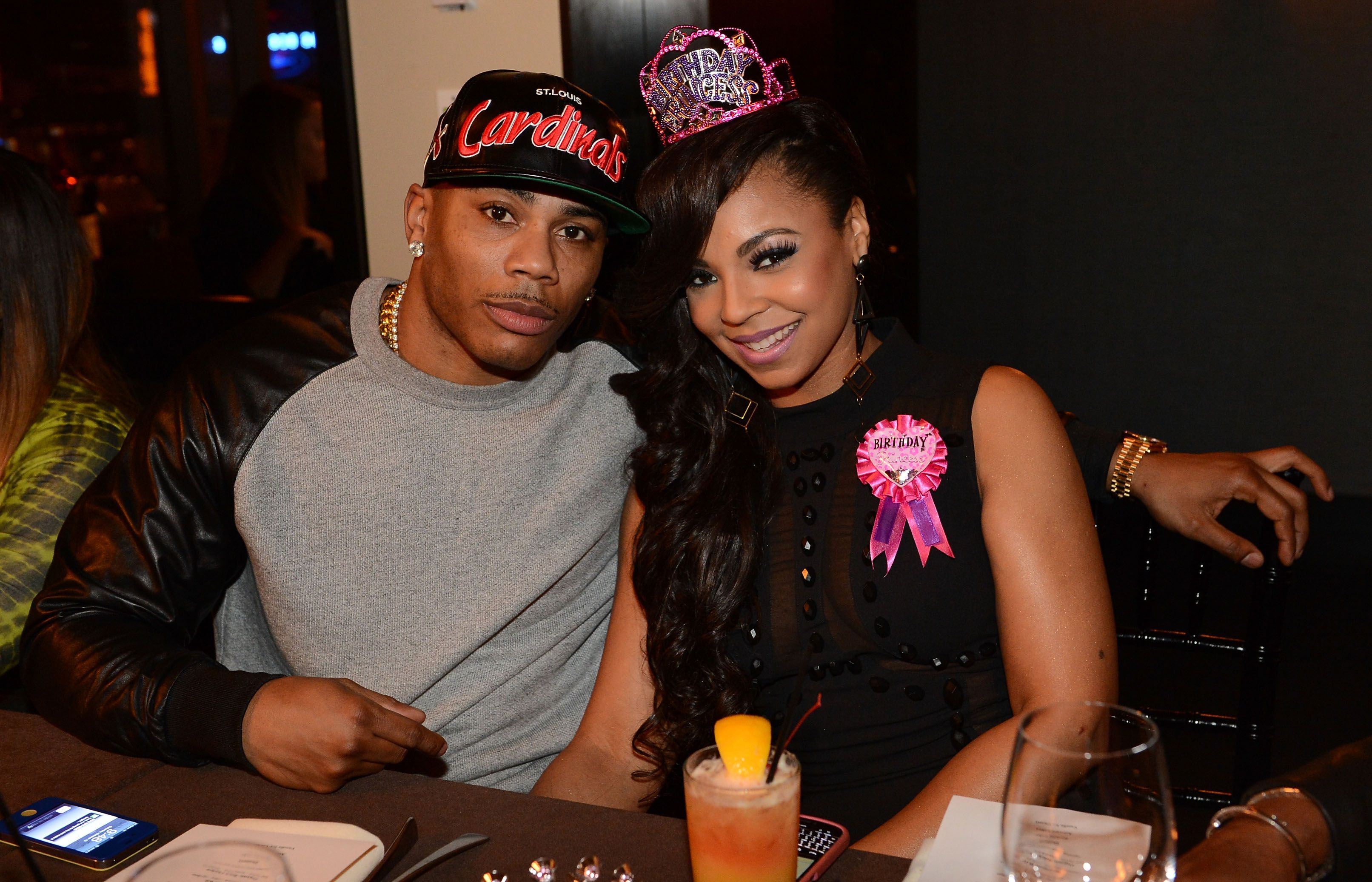 Nelly and Ashanti during Ashanti's surprise birthday dinner in October 2012 in Atlanta, Georgia | Source: Getty Images