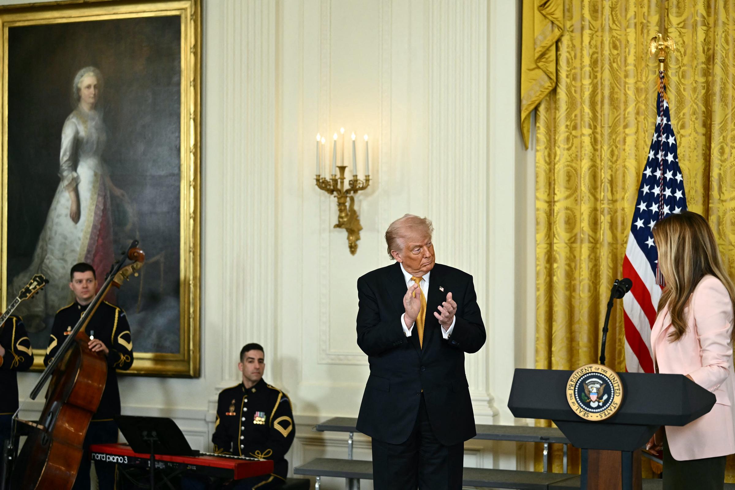 Donald and Melania Trump participate in a Military Mother's Day Event in the East Room of the White House in Washington, DC, on May 6, 2026 | Source: Getty Images