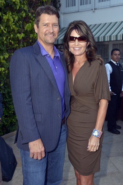 Todd Palin is joined by his wife, former Alaska Governor and Vice Presidential candidate Sarah Palin, at NBC's TCA Party, July 24, 2012 | Photo: Getty Images