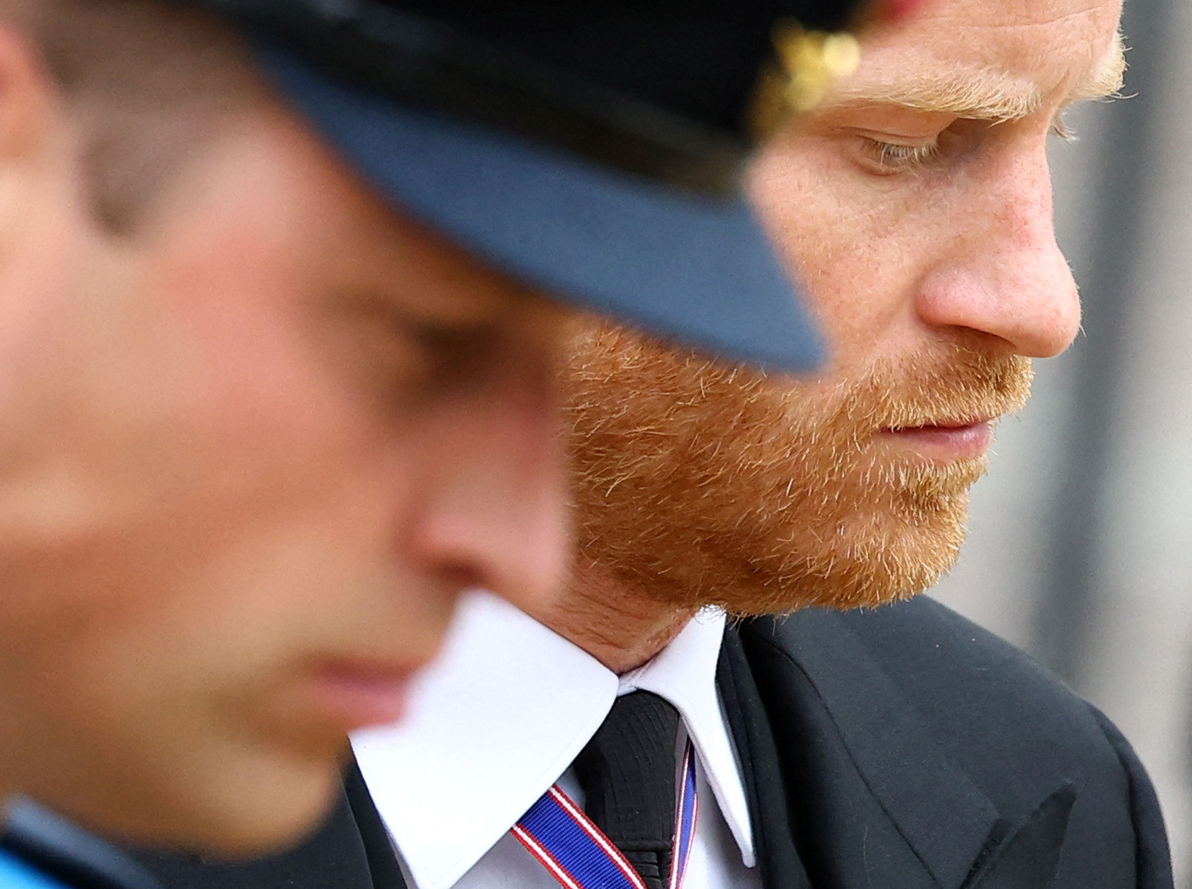 Prince William, Prince of Wales, and Prince Harry, Duke of Sussex follow the coffin of Queen Elizabeth II, in London, England, on September 19, 2022 | Source: Getty Images