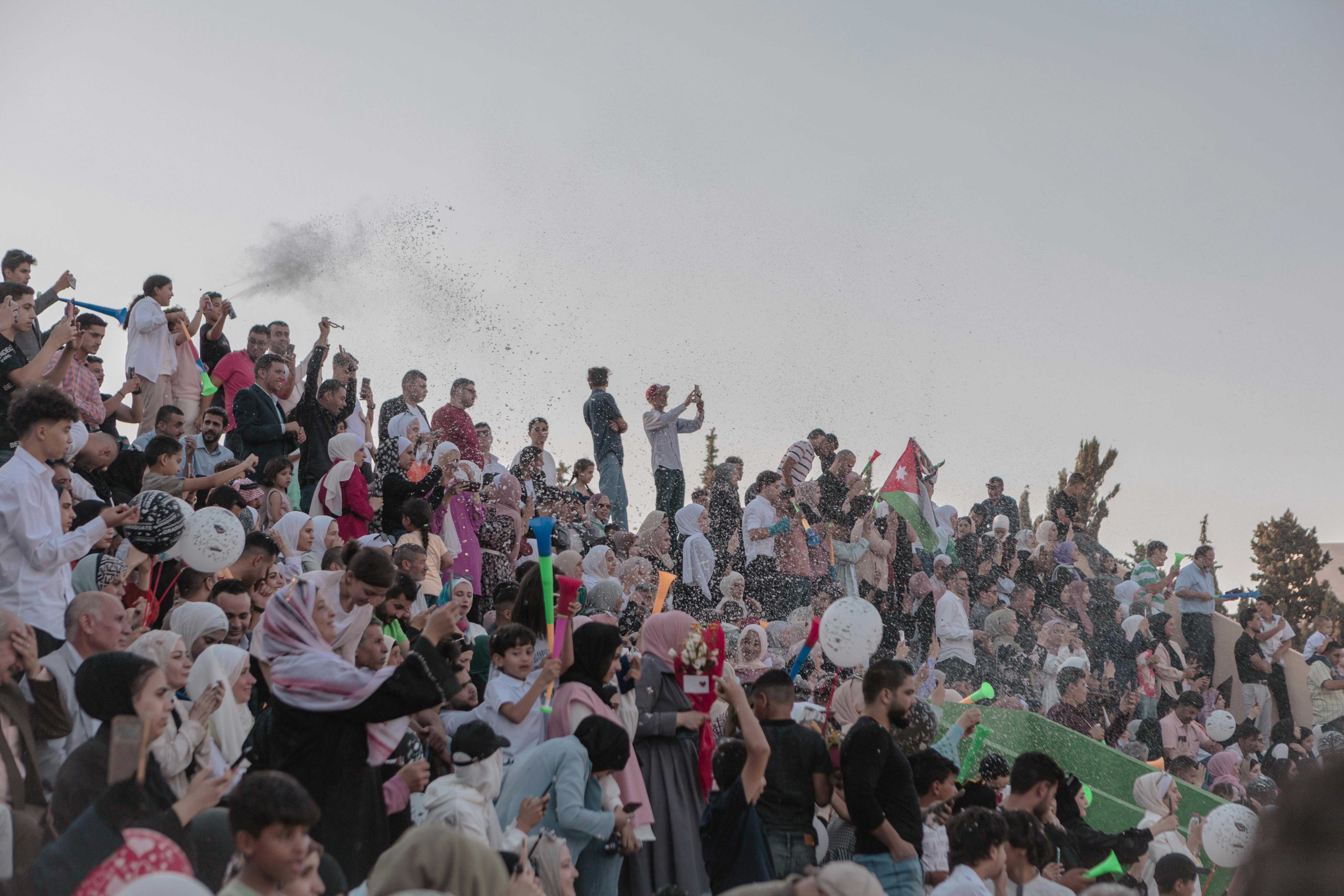 An audience celebrating at a game | Source: Pexels