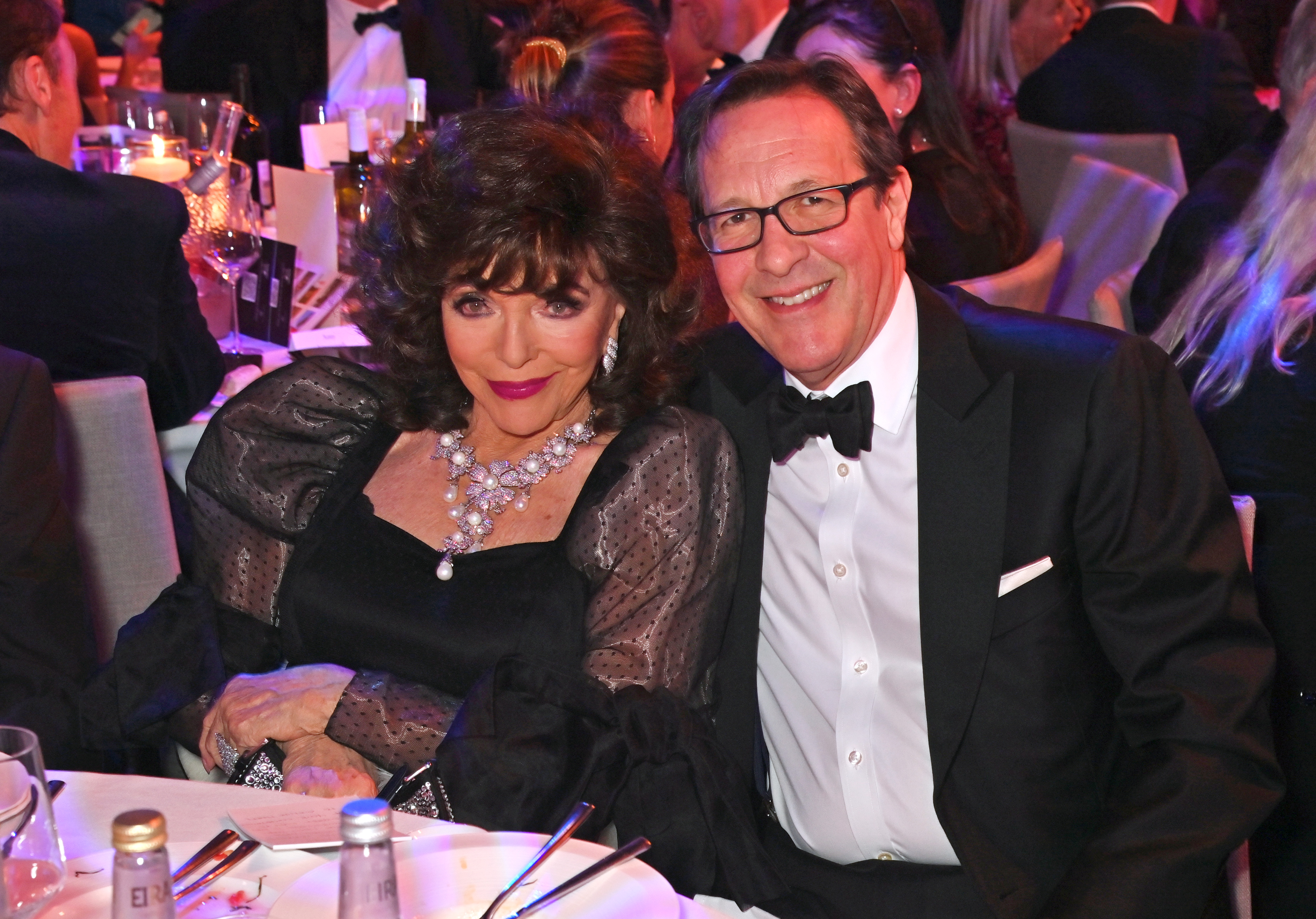 Dame Joan Collins and Percy Gibson during The Variety Club Showbusiness Awards 2024 at The Londoner Hotel on April 28, 2024, in London, England | Source: Getty Images