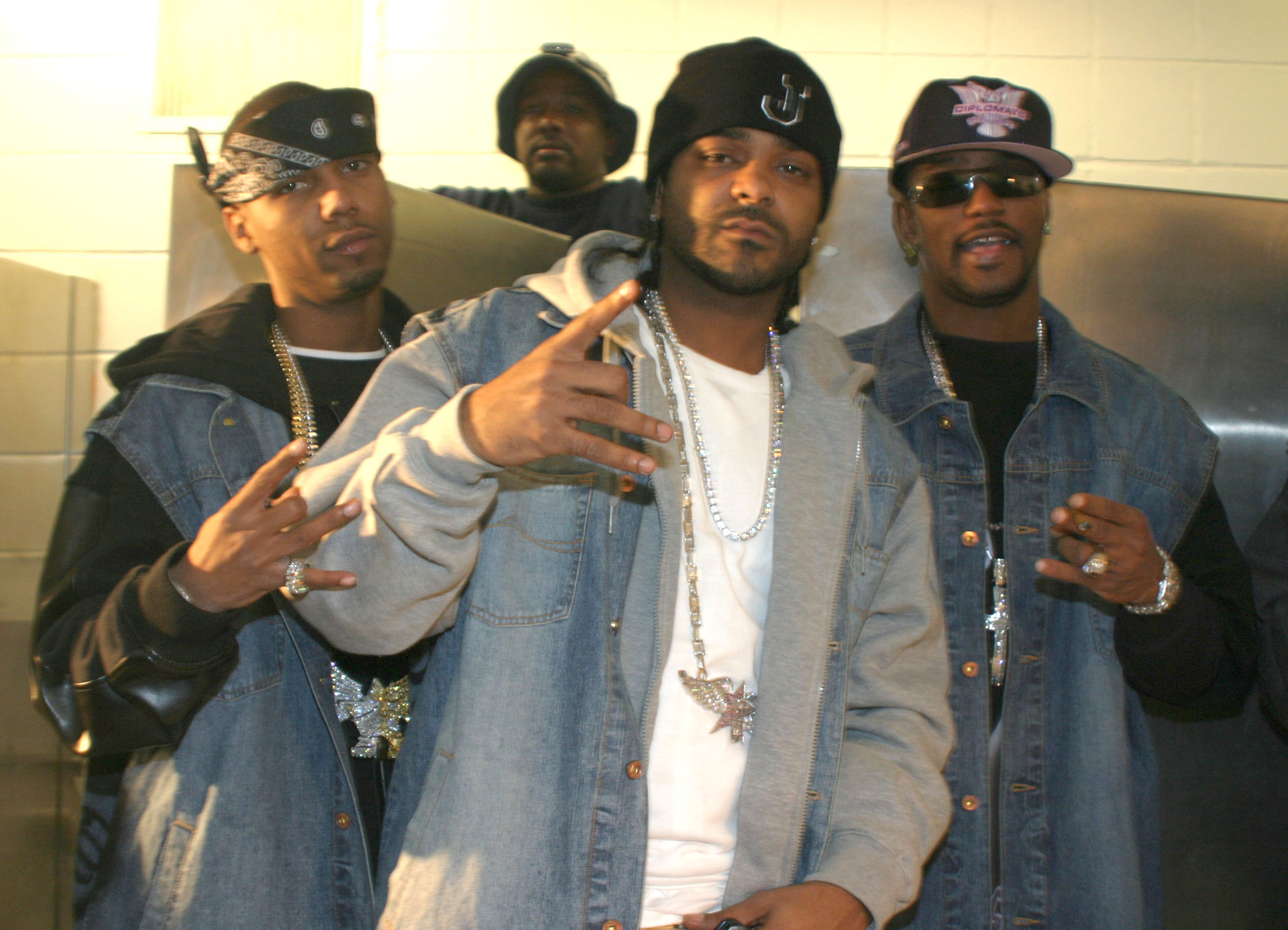 Juelz Santana, Jim Jones, and Cam'ron of The Diplomats photographed at Marcus Zager Park on November 13, 2004, in New York. | Source: Getty Images
