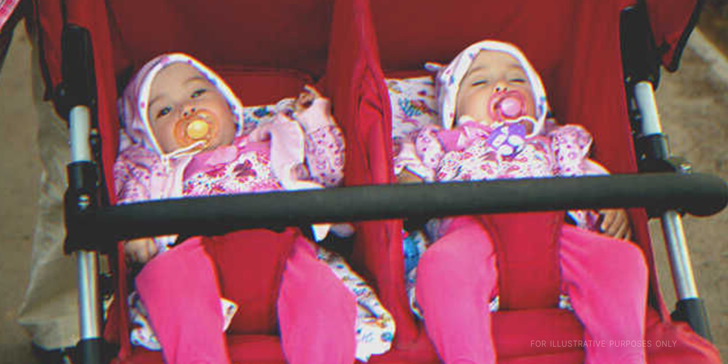 Twins Resting In A Stroller. | Source: Shutterstock