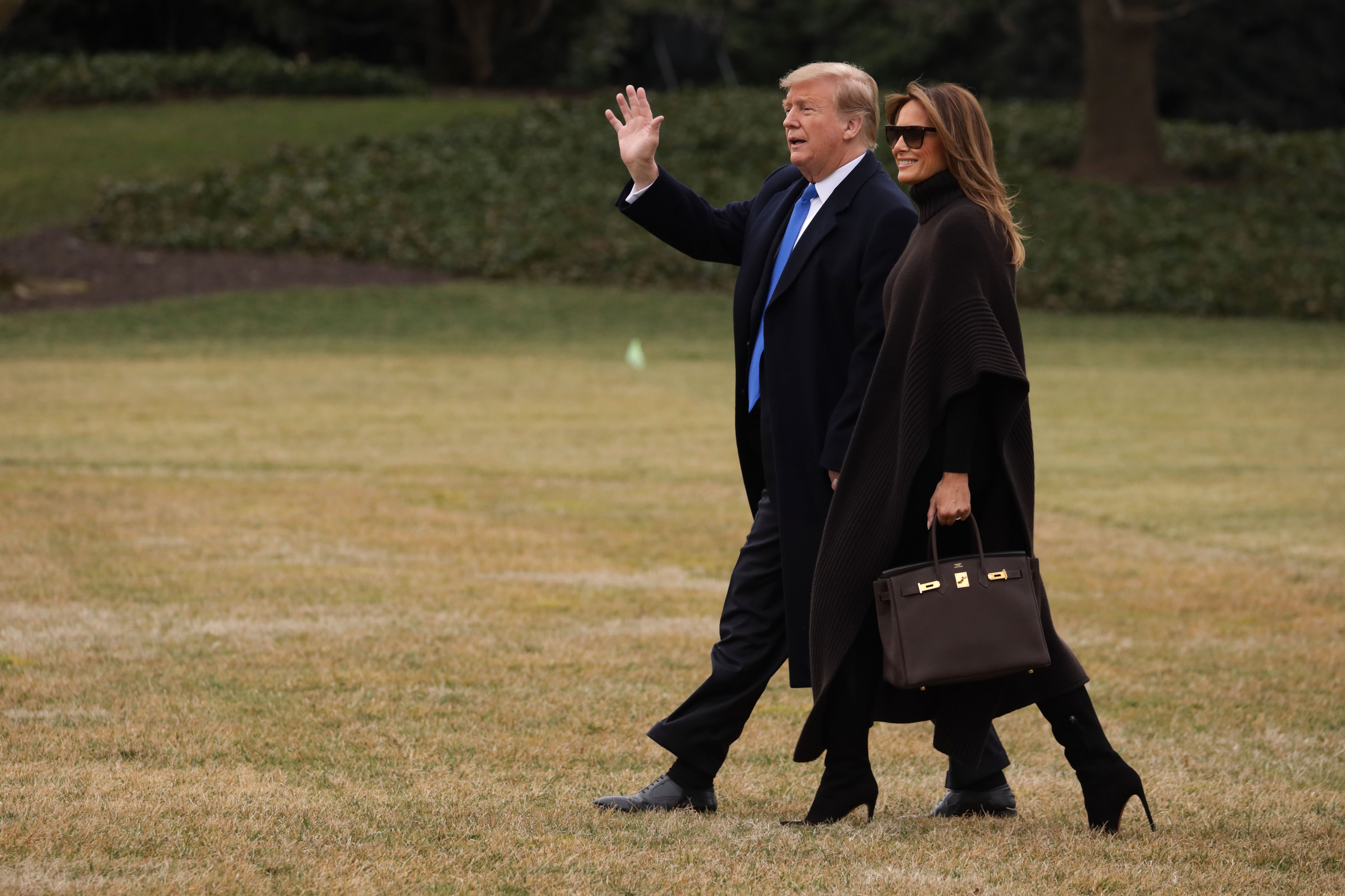 Donald and Melania Trump in the White House grounds, in Washington | Photo: Getty Images