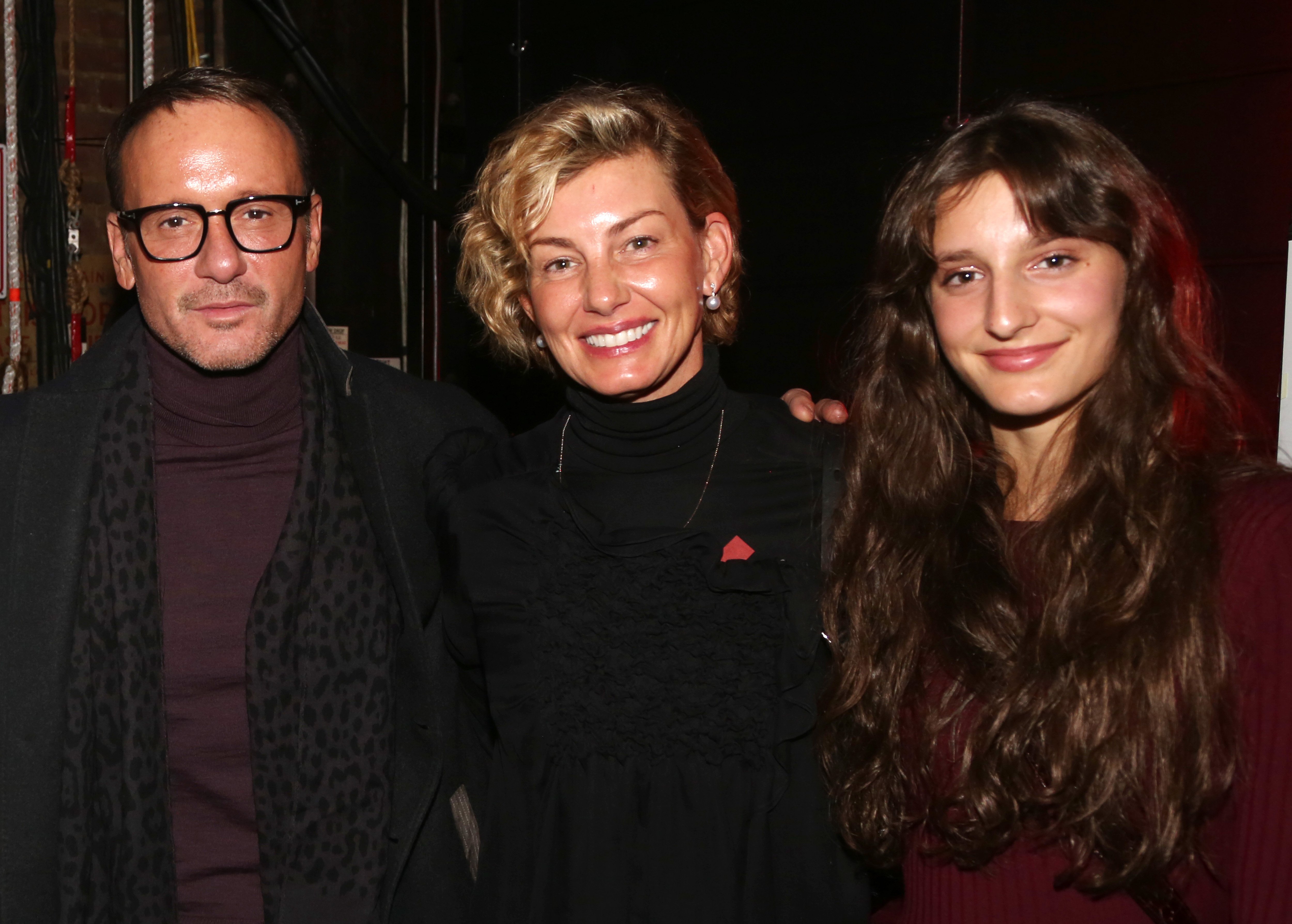 Tim McGraw, wife Faith Hill and daughter Audrey Caroline McGraw pose backstage at the hit musical based on the Baz Luhrmann film "Moulin Rouge!" on Broadway at The Al Hirshfeld Theatre on January 18, 2020 in New York City | Source: Getty Images 