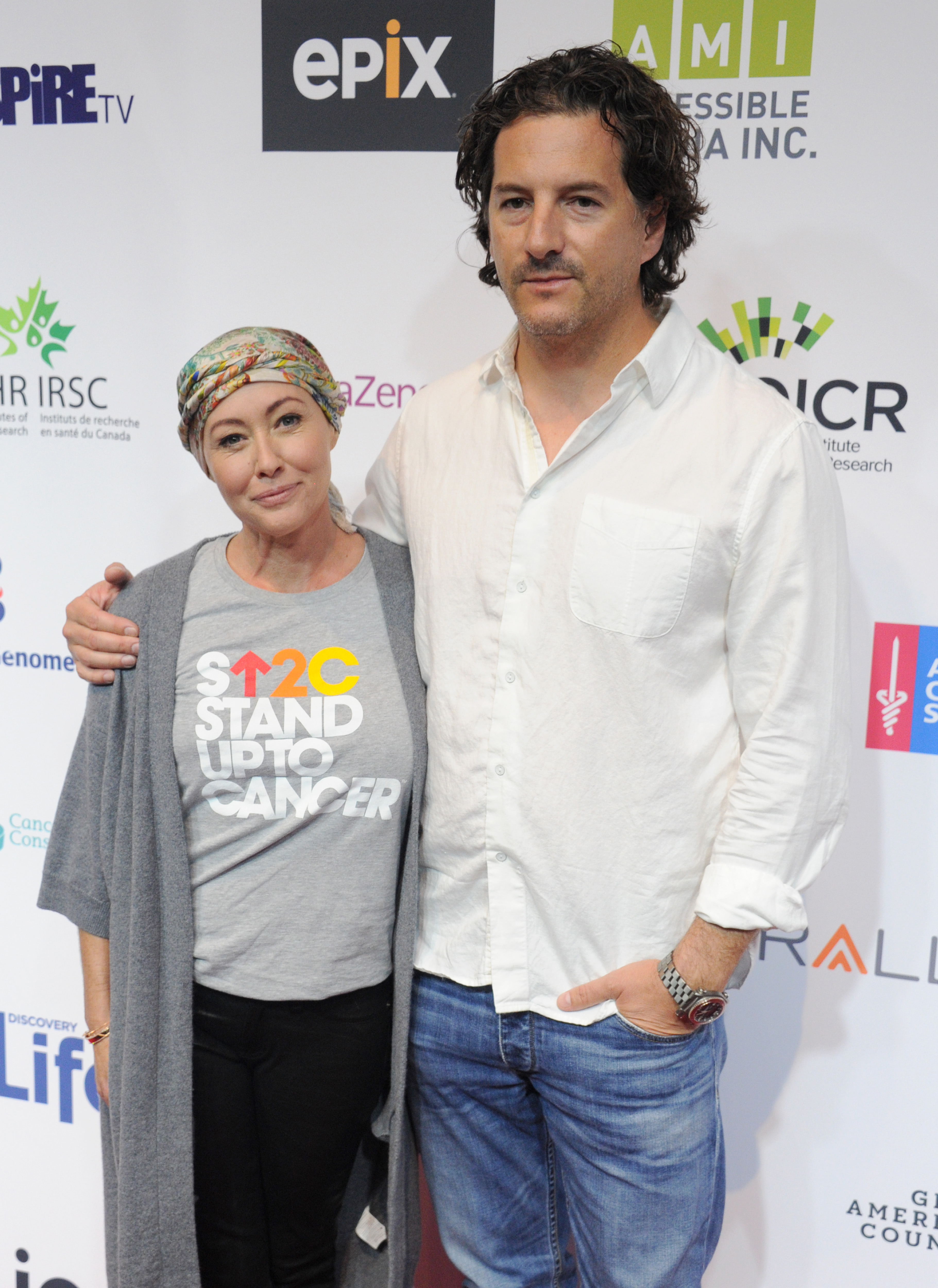 Shannen Doherty and Kurt Iswarienko attend Hollywood Unites for the 5th Biennial Stand Up To Cancer (SU2C), A Program of The Entertainment Industry Foundation (EIF) at Walt Disney Concert in Los Angeles, California Hall on September 9, 2016. | Source: Getty Images