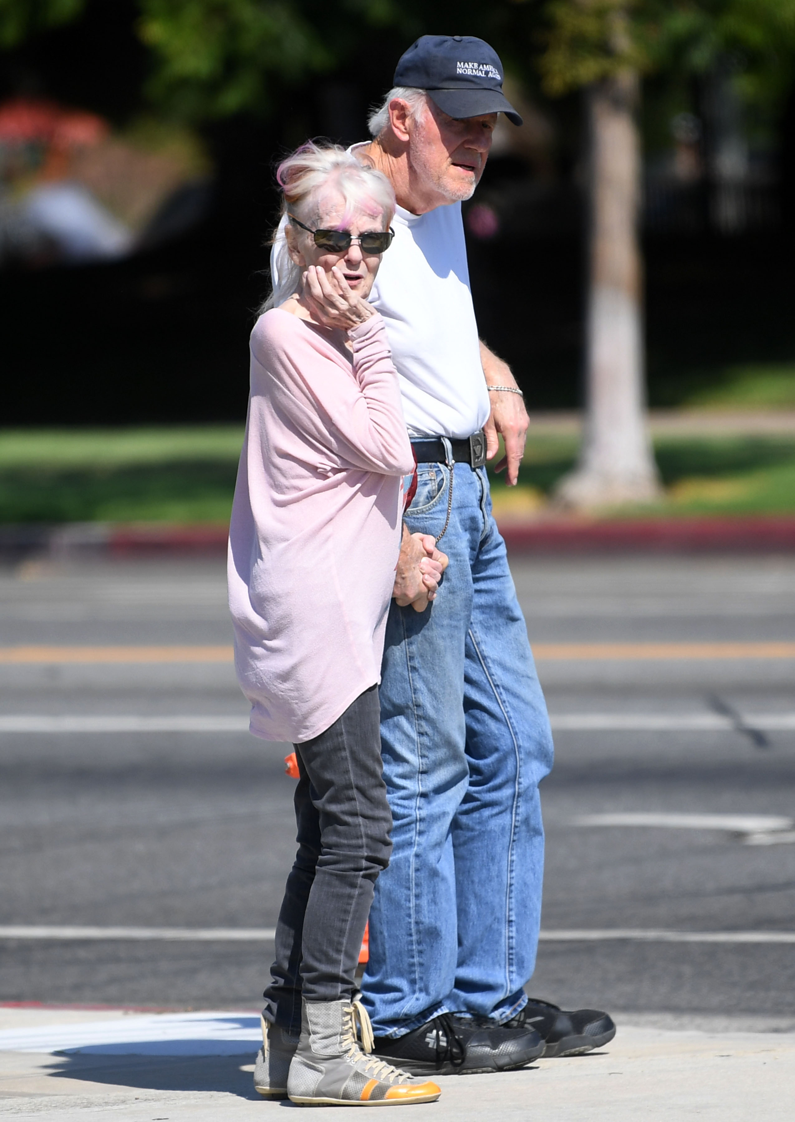 Shelley Fabares and Mike Farrell hold hands while crossing a street in Los Angeles on July 18, 2025. | Source: Getty Images