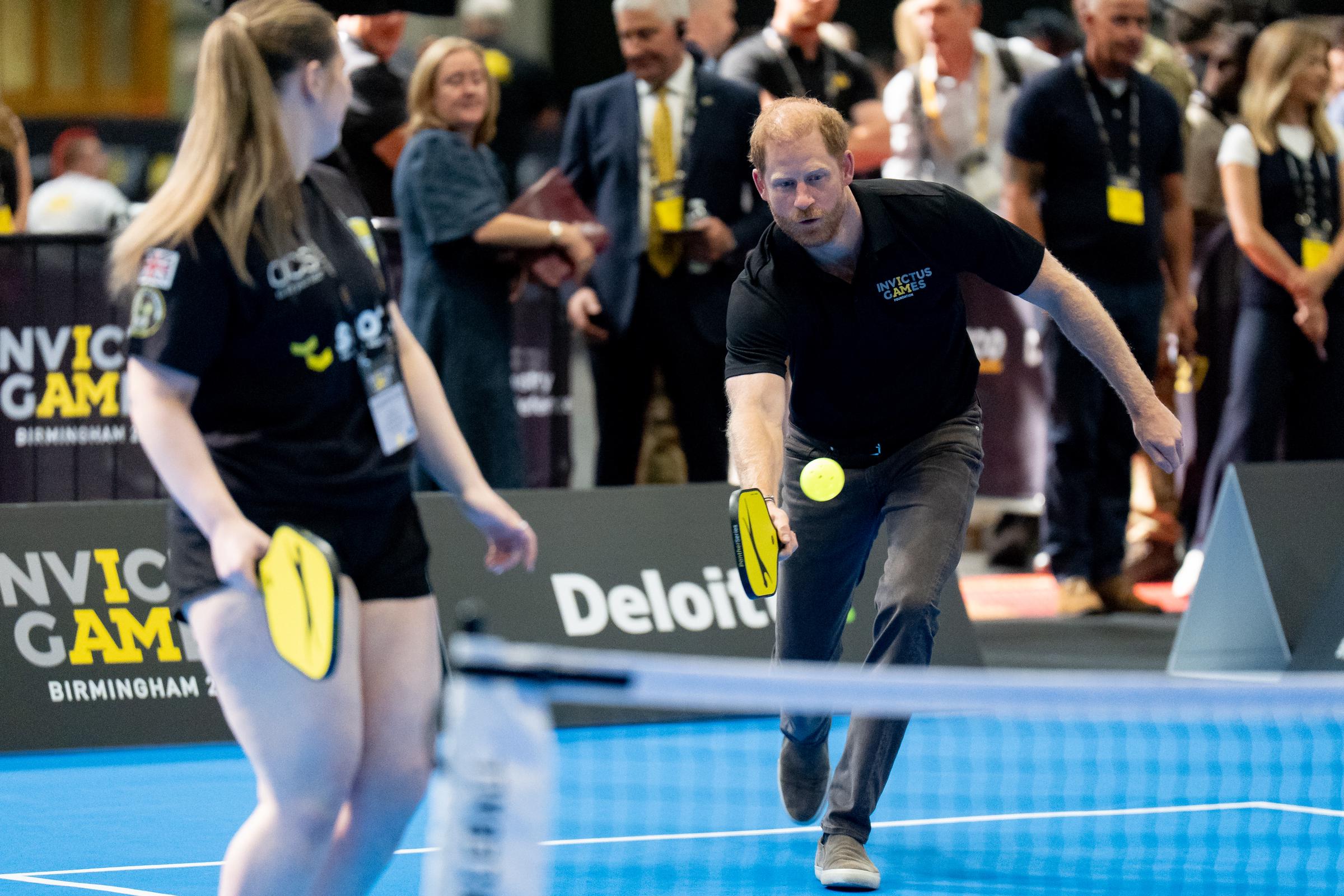 Harry joined competitors on the pickleball court during Birmingham's "One Year to Go" celebration for the 2027 Invictus Games. The appearance was one of several solo engagements that preceded his later appearance at the TIME100 Sports Gala in New York. | Source: Getty Images