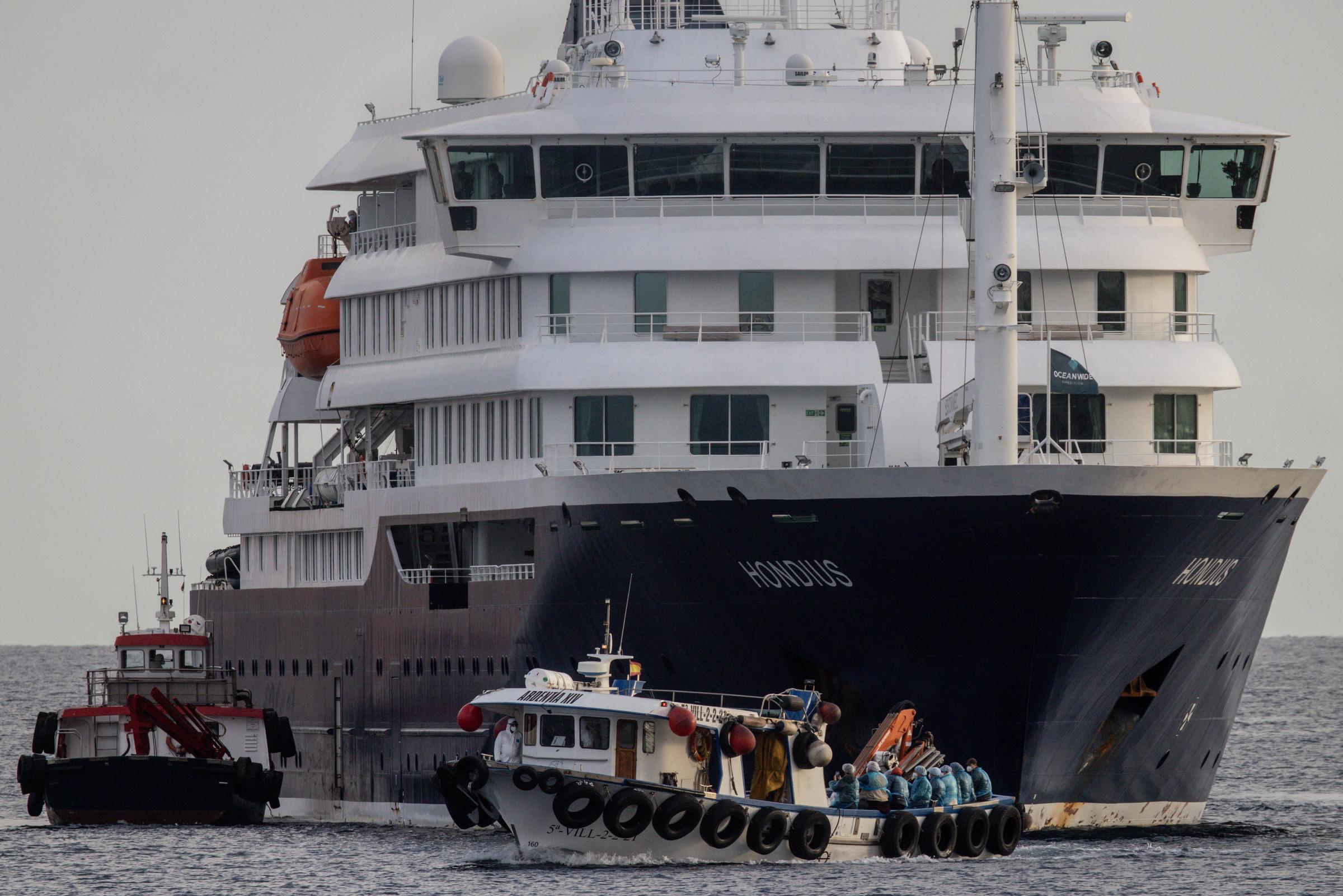 American citizens (Dressed in blue) are evacuated in a small boat from the MV Hondius after docking in the Granadilla Port on May 10, 2026 in Tenerife, part of the Canary Islands, Spain | Source: Getty Images