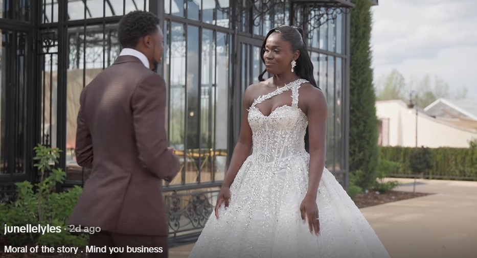 Noah Lyles and Junelle Bromfield face each other as he takes in her full wedding look | Source: TikTok/junellelyles