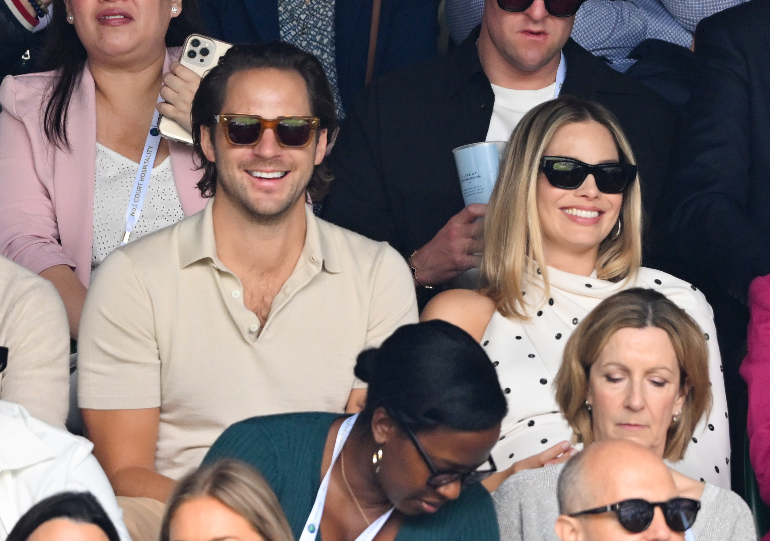 Tom Ackerley and Margot Robbie on day 12 of the Wimbledon Tennis Champioinships in at the All England Lawn Tennis and Croquet Club on July 12, 2024 in London, England | Source: Getty Images