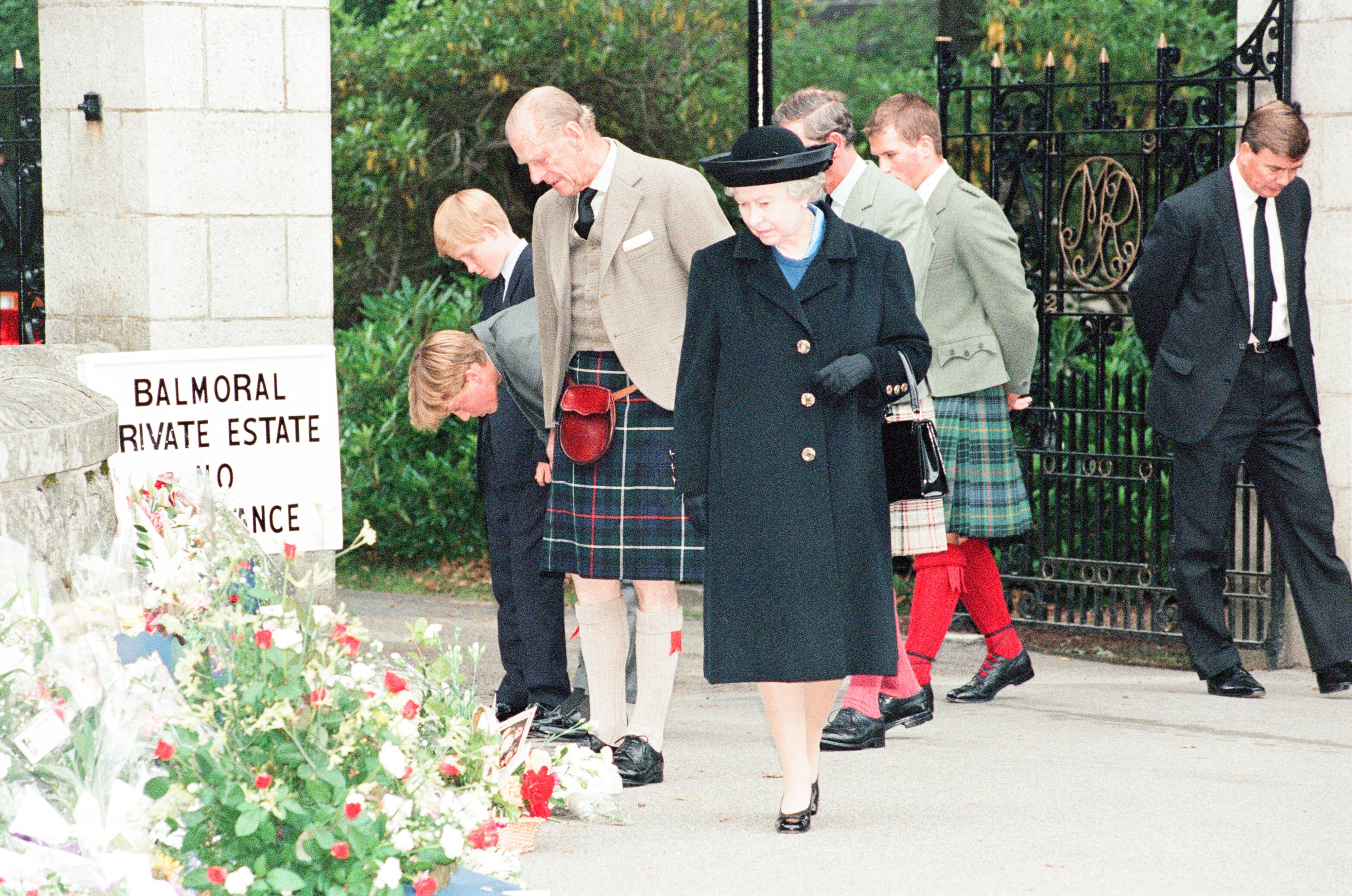 Queen Elizabeth II, Prince Philip, Prince Charles, Prince William, Prince Harry, and Peter Phillips at Balmoral Estate, Scotland, on September 5, 1997 | Source: Getty Images