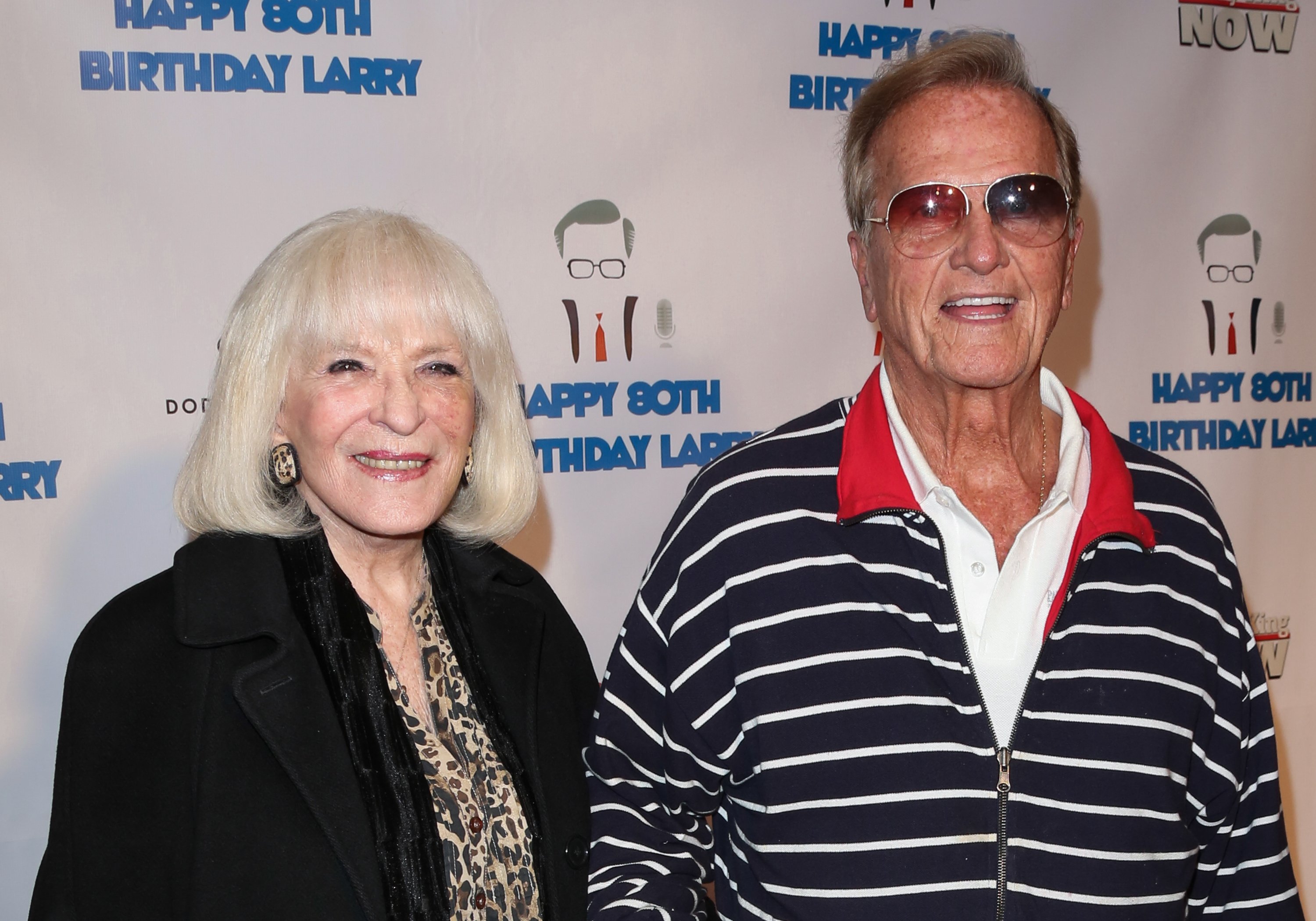 Singer Pat Boone (R) and his wife Shirley Boone attend a surprise party for Larry King's 80th Birthday at Dodger Stadium on November 15, 2013 in Los Angeles, California. | Source: Getty Images