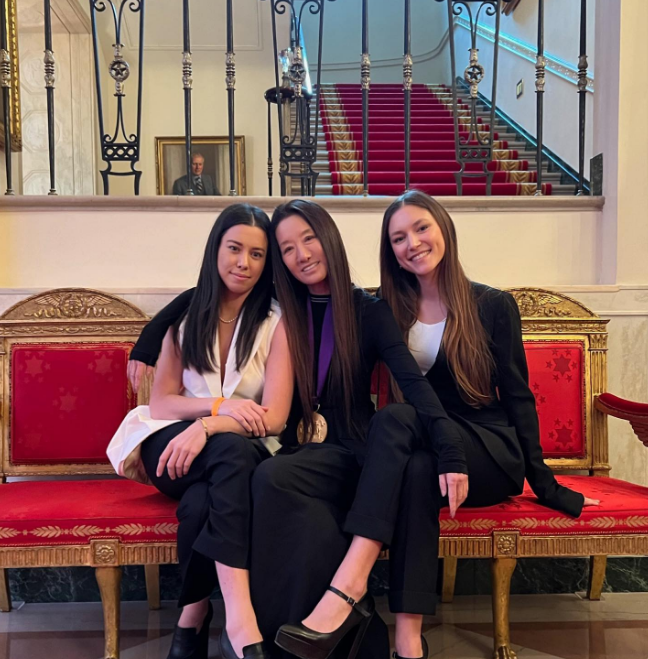 The girls grew up to become beautiful, educated women who achieved success outside of the fashion world. In this photo, Cecilia Becker and Josephine Becker posed together on a lounge chair inside an academic building on March 22, 2023. | Source: Instagram/verawang