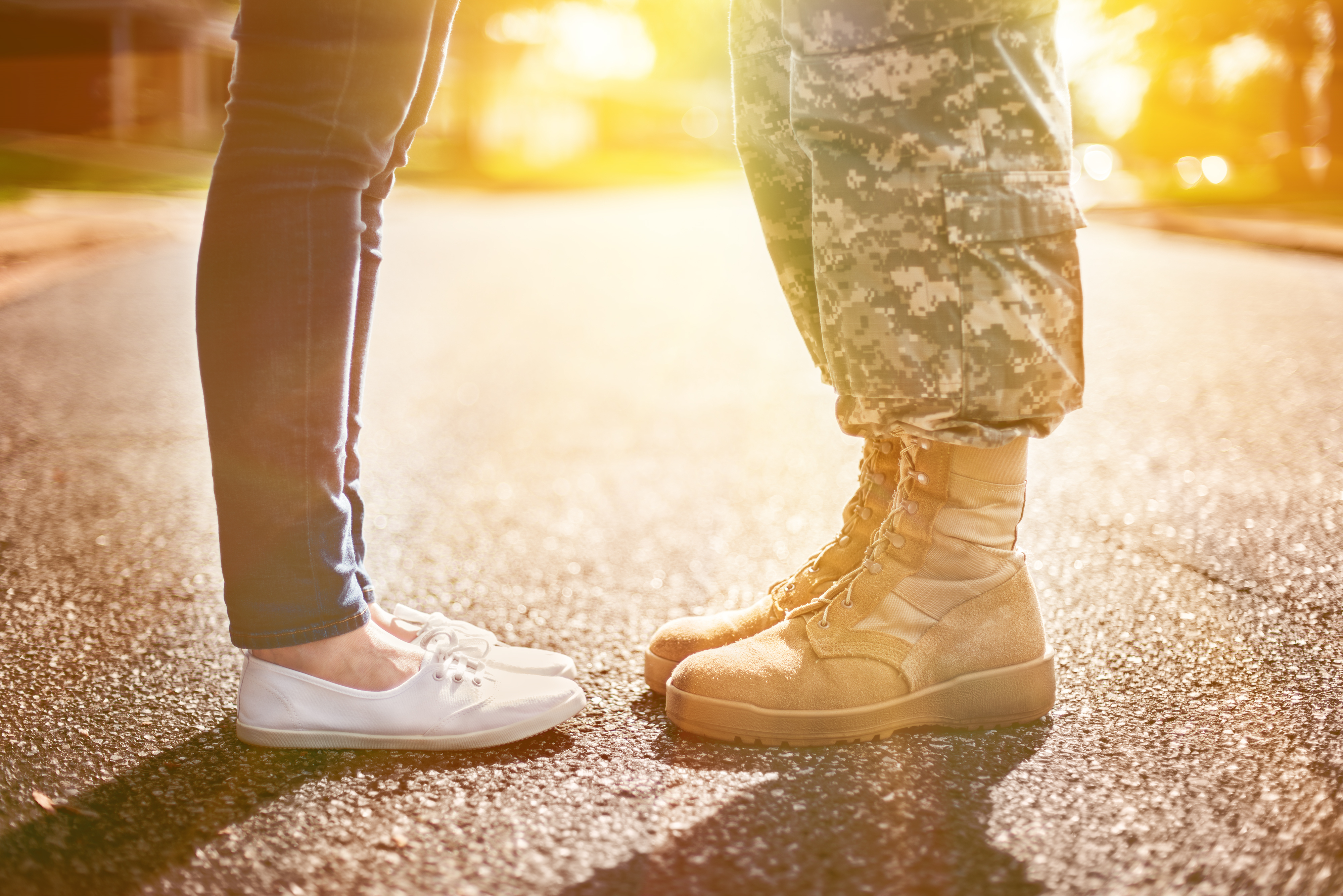 Young military couple kissing each other. | Source: Shutterstock
