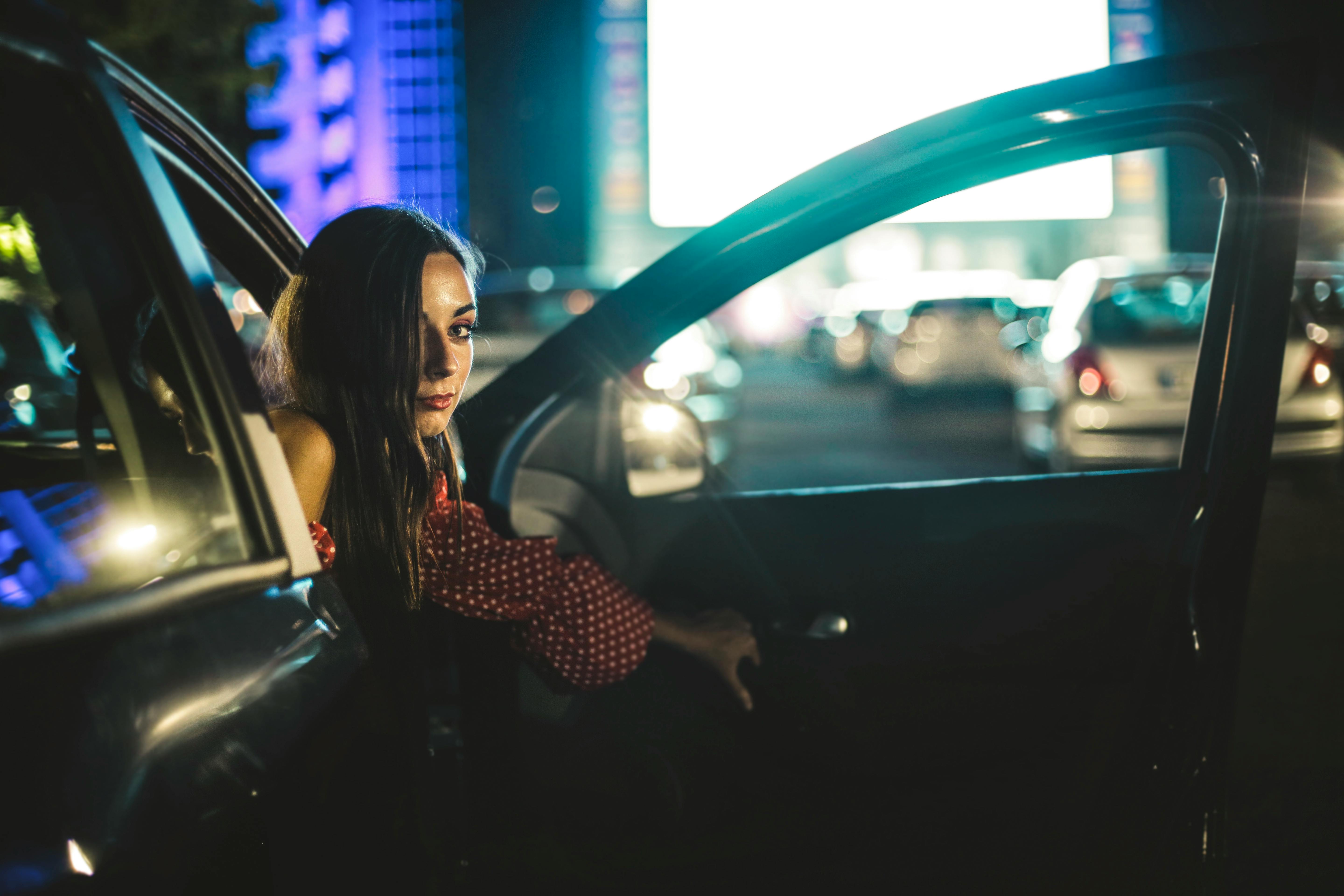 A woman stepping out of a car | Source: Pexels