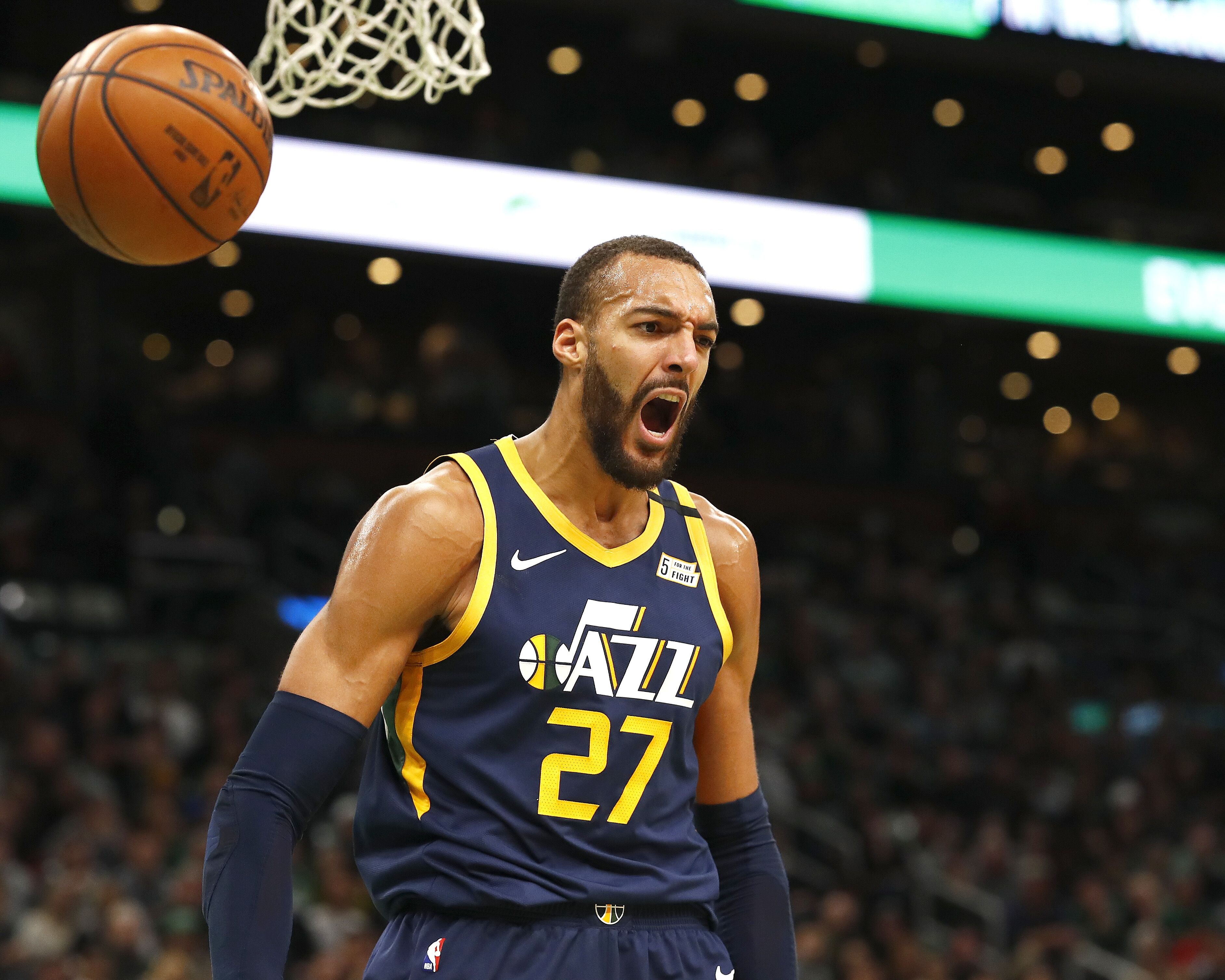 Rudy Gobert reacts after dunking during the third quarter of the game against the Boston Celtics at TD Garden on March 06, 2020 in Boston, Massachusetts. | Source: Getty Images
