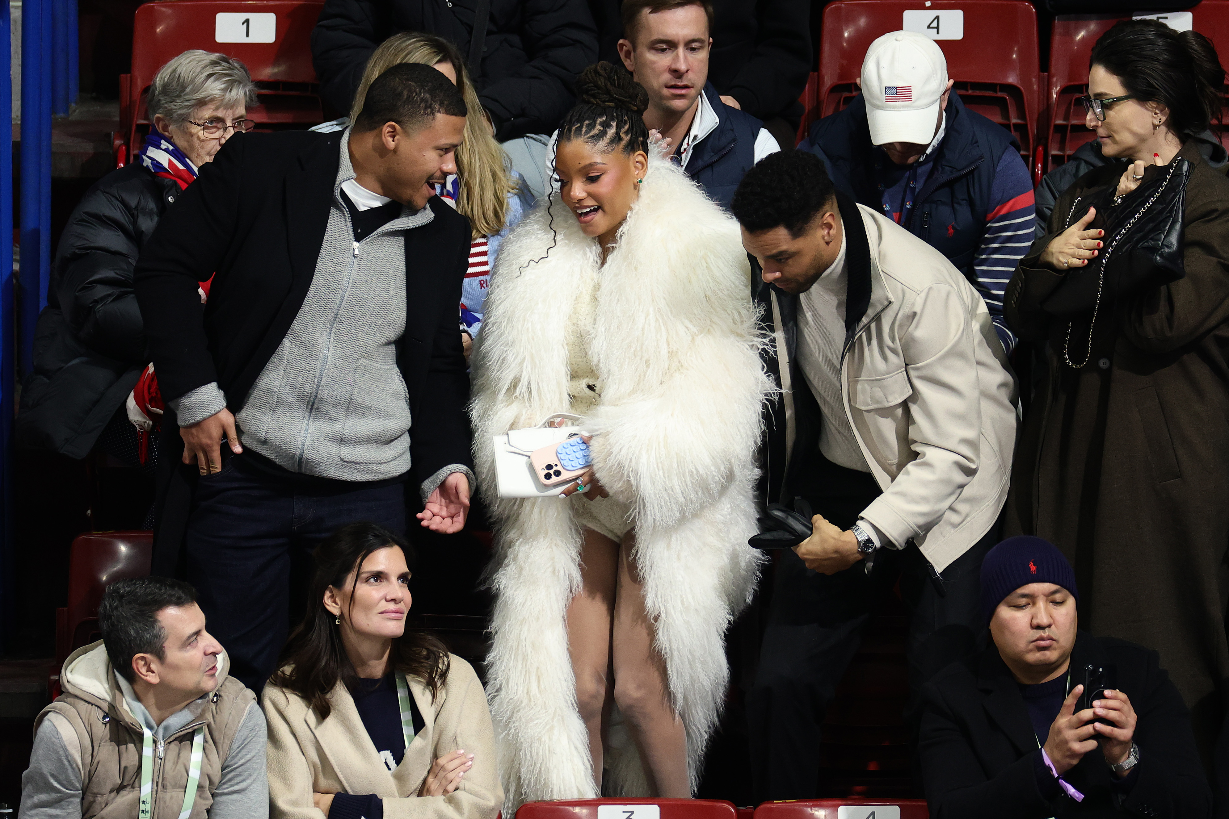Halle Bailey and Regé-Jean Page attend the Women's Single Skating - Short Program on day 11 of the Milano Cortina Winter Olympic games at Milano Ice Skating Arena on February 17, 2026, in Milan, Italy | Source: Getty Images