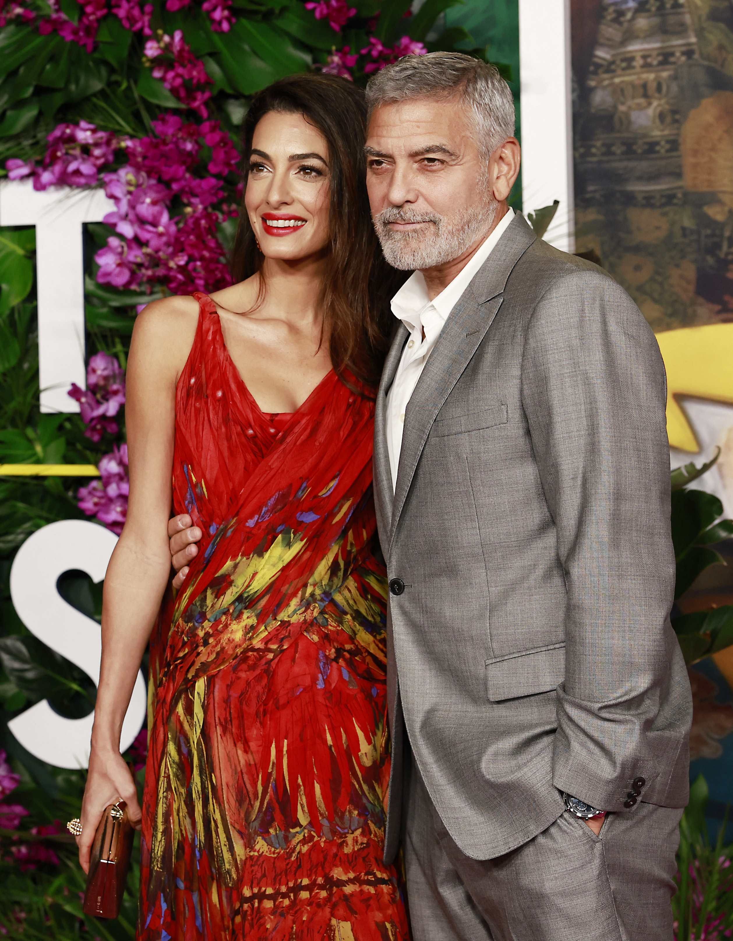 Lebanese-British barrister Amal Clooney (L) and US actor George Clooney arrive for the premiere of "Ticket to Paradise" at the Regency Village Theatre. in Westwood, California, on October 17, 2022. | Source: Getty Images