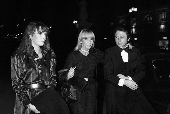 Dany Saval et Michel Drucker lors d'une soirée en l'honneur de Michèle Morgan à Paris.|Photo : Getty Images