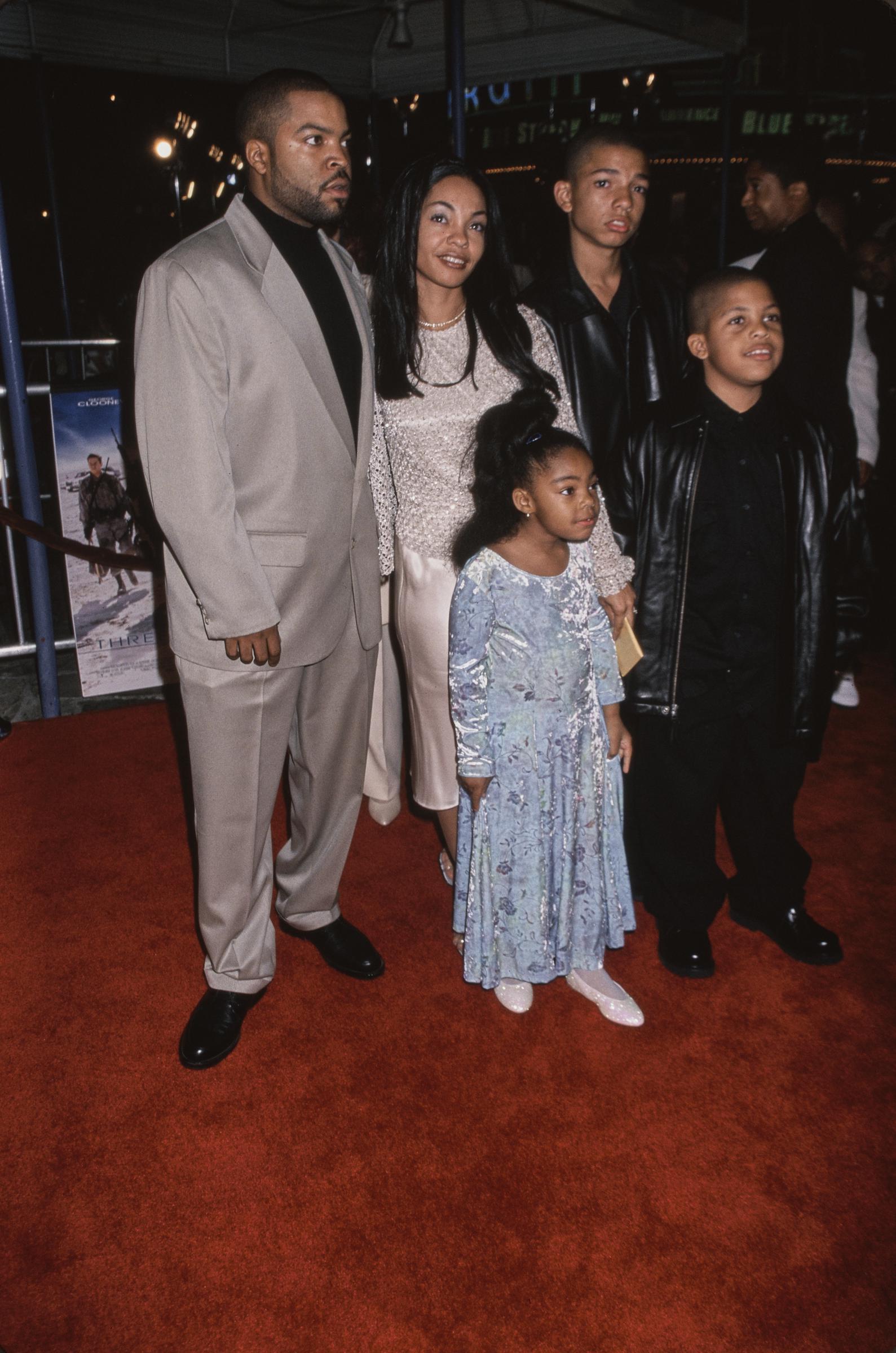 Ice Cube and Kimberly Woodruff with three of their kids, Darrell Jackson, O'Shea Jackson Jr., and Kareema Jackson at the premiere of "Three Kings" in Los Angeles, California on September 27, 1999. | Source: Getty Images